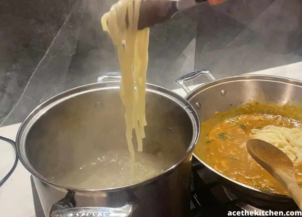 frozen udon being cooked